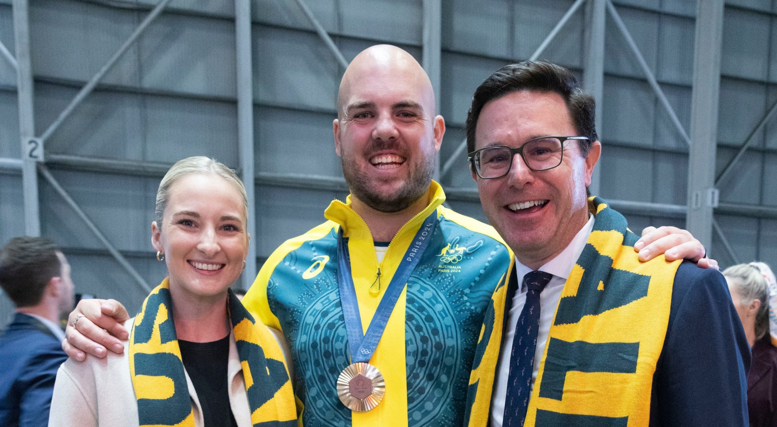 Member for Maranoa David Littleproud with Allora Olympian Matthew Denny and his partner Mia - edit